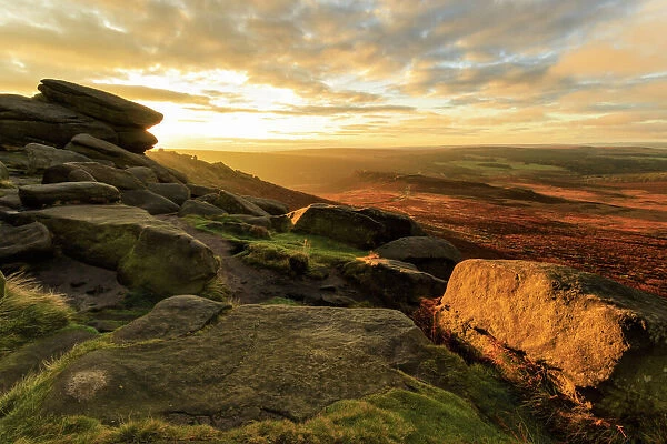 Carl Wark Hill Fort and Hathersage Moor from Higger Tor, sunrise in autumn, Peak