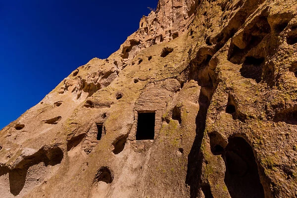 Cave dwellings on the Cliffside of Pueblo Indian Ruins in Bandelier National Monument