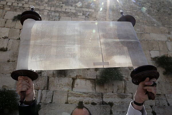 A ceremonial reading of the Torah from Torah scroll under the Western Wall, Jerusalem