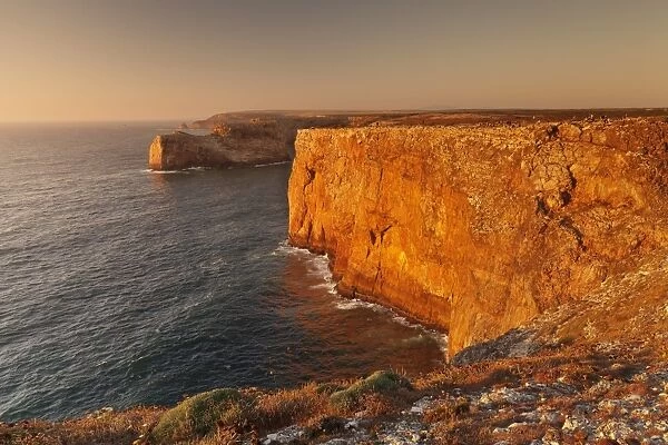 Cliff coast at sunset, Cabo de Sao Vicente, Sagres, Algarve, Portugal, Europe