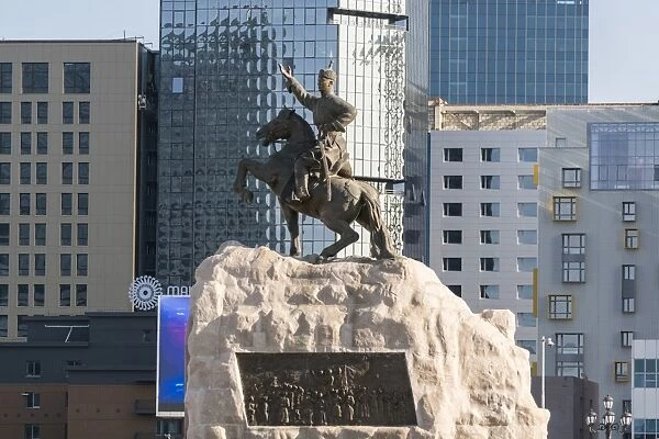 Damdin Sukhbaatar statue with skyscrapers in the background, Ulan Bator, Mongolia