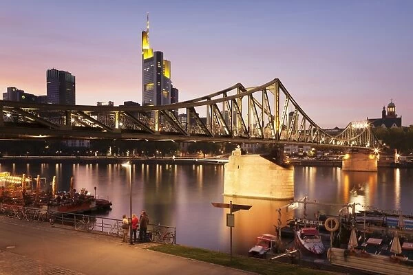 Eiserner Steg Bridge and financial district at sunset, Frankfurt, Hesse, Germany, Europe