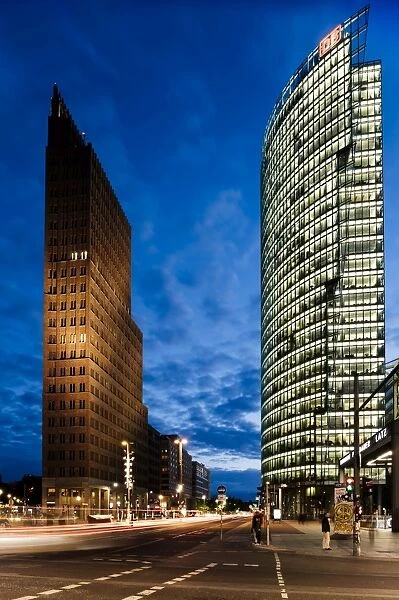 Exterior of Kollhoff Tower and Deutsche Bahn Tower at night, Potsdamer Platz, Berlin