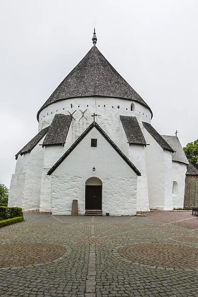 Exterior view of the 13th century circular design Osterlars Church, Bornholm, Denmark, Scandinavia, Europe