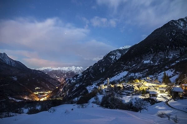 The fairy-tale village of Soglio lies on a ledge on the mountainside of Val Bregaglia, Canton of Graubunden, Switzerland, Europe
