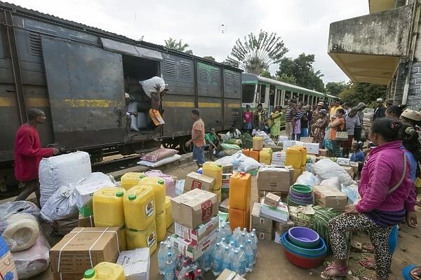 Fianarantsoa to Manakara FCE train, cargo being unloaded, eastern area, Madagascar