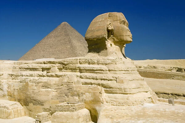 The Great Sphinx and one of the pyramids at Giza, UNESCO World Heritage Site, Cairo
