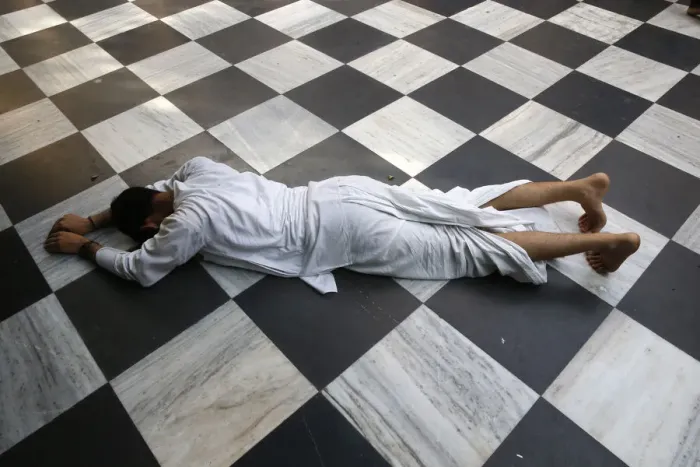 Framed Print : Hindu devotee prostrating at Krishna-Balaram temple Print Framed Print : Hindu devotee prostrating at Krishna-Balaram temple Print