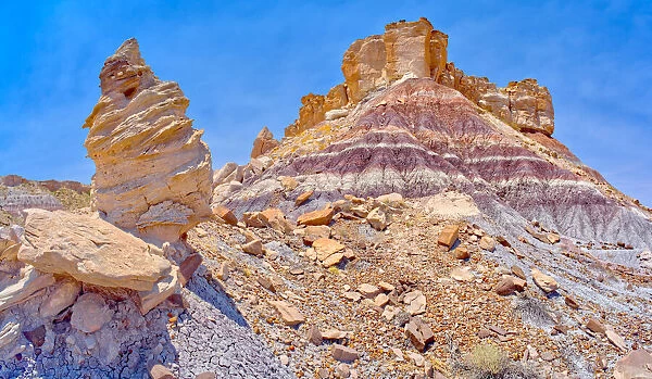 A hoodoo formation called Medusas Child below the cliffs of Agate Plateau in