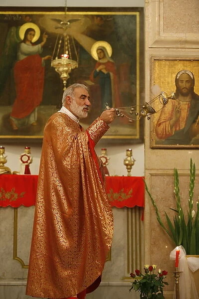Melkite priest, Emile Shoufani, celebrating Mass in Nazareth, Nazareth, Galilee, Israel