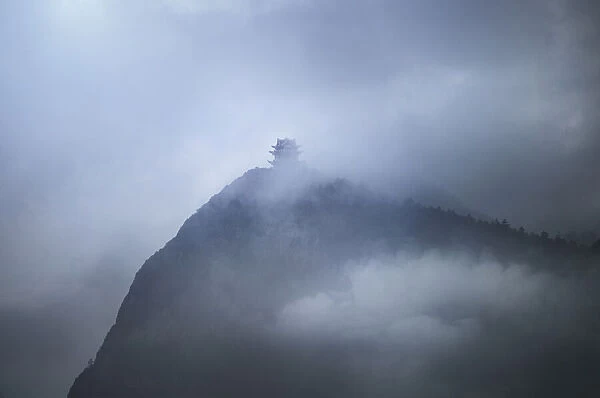 Misty pagoda in the fog on top of Emeishan, Sichuan, China, Asia