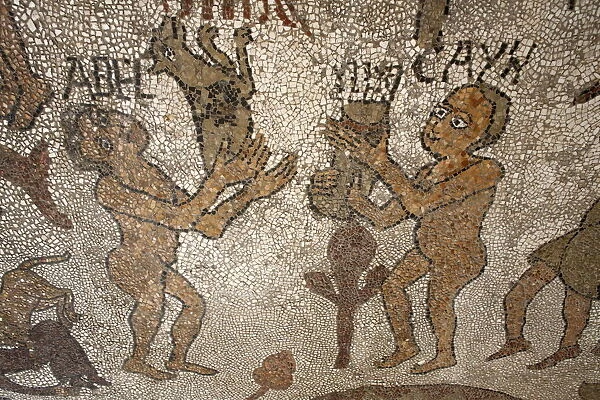 Mosaic of Abel and Cain offering presents to God on the floor of the central nave
