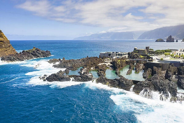 Natural pools formed by volcanic lava filled with crystal-clear sea water, Porto Moniz