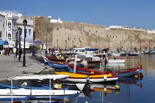 Old Port Canal, fishing boats and wall of the Kasbah, Bizerte, Tunisia