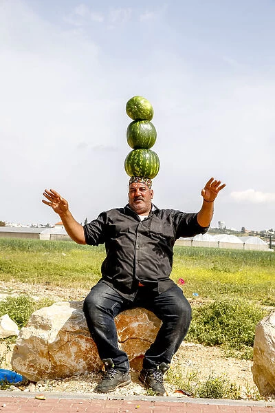 Palestinian selling watermelons at Al-Jalameh checkpoint on Israel-Palestine border