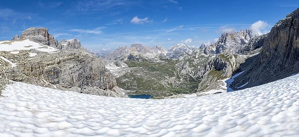 Panoramic of Forcella Dei Laghi mountain path leading to Rifugio Locatelli hut in summer