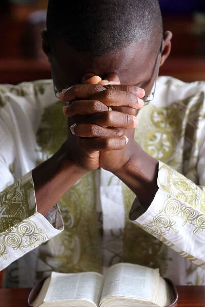 Prayer, Sunday morning Catholic Mass, Lome, Togo, West Africa, Africa