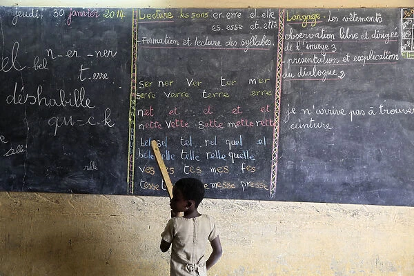 Pupil at the blackboard, primary school, Lome, Togo, West Africa, Africa