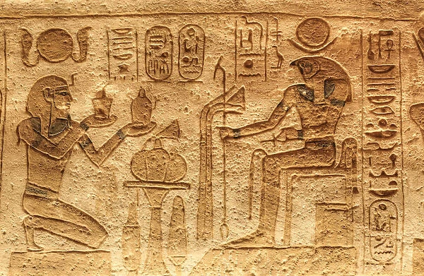 Ramses II on left with God Horus seated on right, Sunken Relief, Lateral Chamber