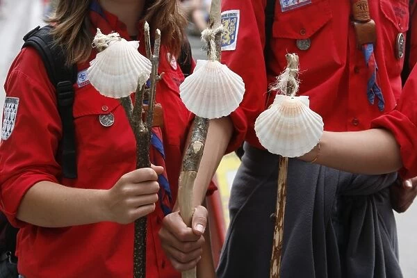 Scouts with Santiago pilgrimage scallop shells, Lourdes, Hautes Pyrenees, France, Europe