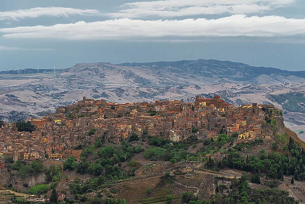 The small wonderful town of Calascibetta on top of a rocky hill in the Sicilian countryside, Enna province, Sicily, Italy, Mediterranean, Europe