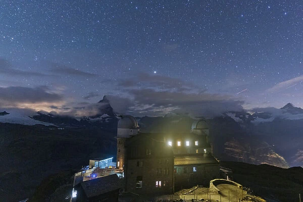 Starry sky over the Kulmhotel Gornergrat and Matterhorn, Zermatt, canton of Valais