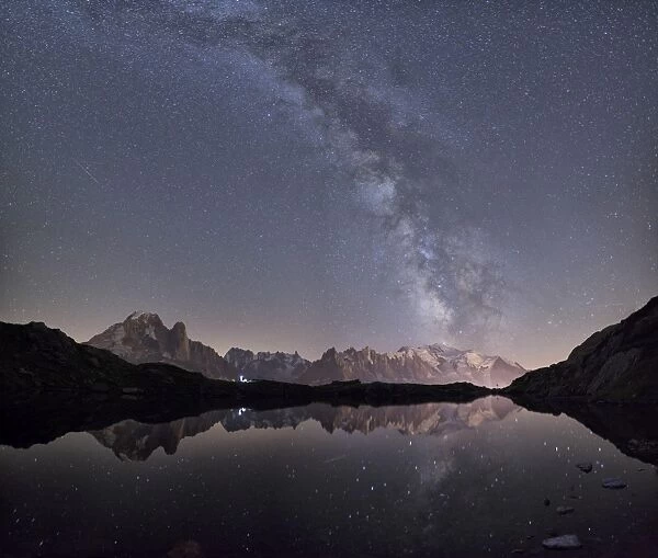 Starry sky over Mont Blanc range seen from Lac des Cheserys, Haute Savoie. French Alps