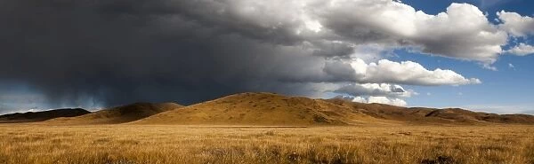 Stormy sky over rangelands on the edge of the Tibetan Plateau in Sichuan Province