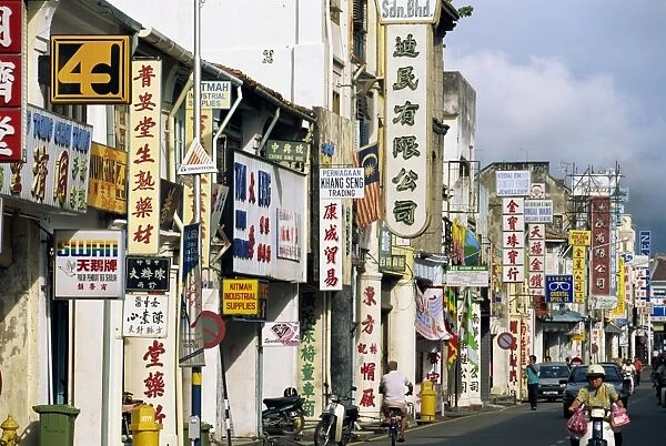 Street scene with shop signs in Chinatown in the centre of Georgetown