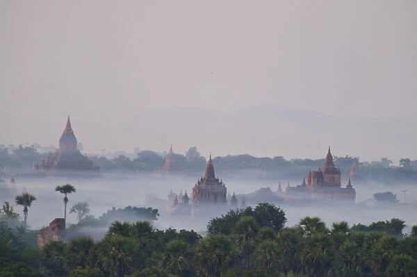 Sun rise above the temples and pagodas of the old ruined city, Bagan, Myanmar, Asia
