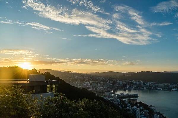 The sun sets over a new home atop Mount Victoria in Wellington, North Island, New Zealand