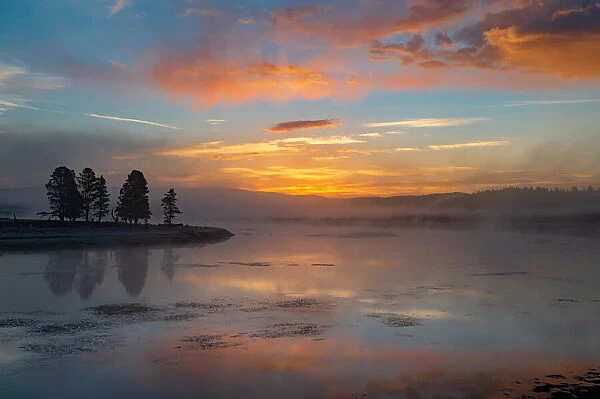 Sunrise over Yellowstone Lake with reflection, Yellowstone National Park