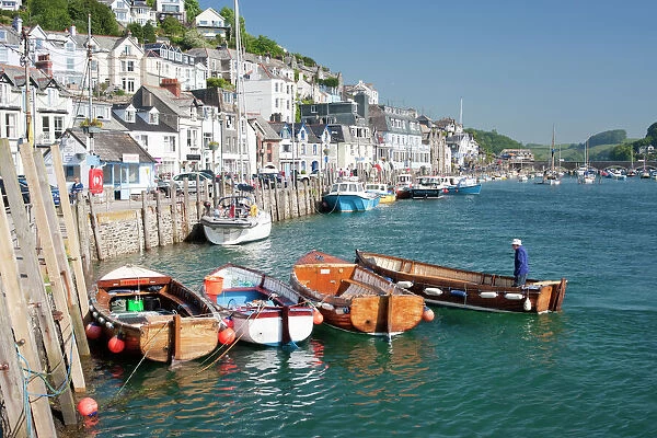 Tenders moored on the quayside in Looe, Cornwall, England, United Kingdom, Europe