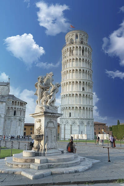 Tourists admiring the Renaissance fountain and the Leaning Tower of Pisa in summer