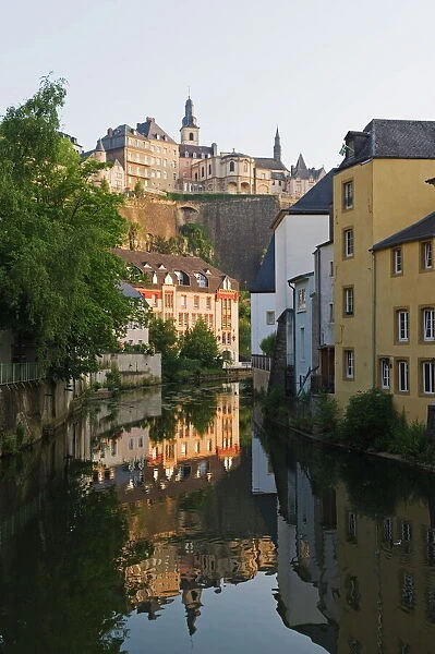 Town houses reflected in canal, Old Town, Grund district, UNESCO World Heritage Site