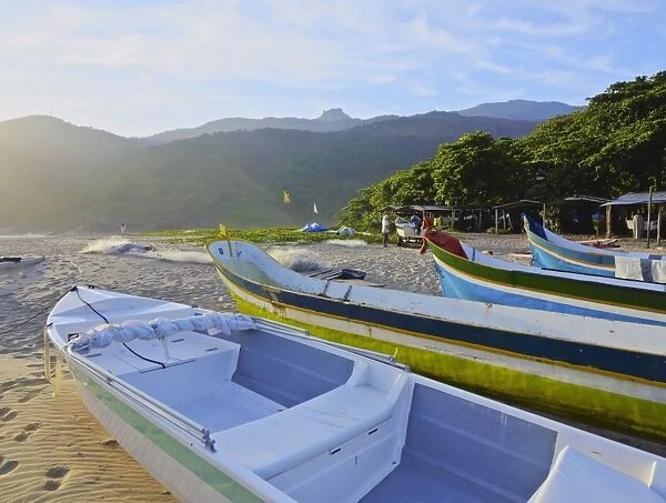 Traditional colourful boats on the beach in Bonete, Ilhabela Island, State of Sao Paulo