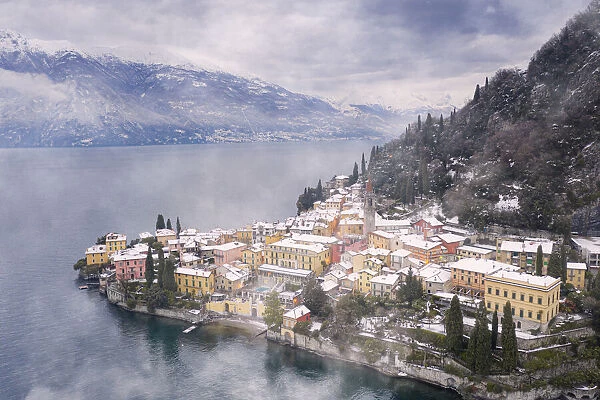 Traditional houses of Varenna old town after a snowfall, Lake Como, Lecco province