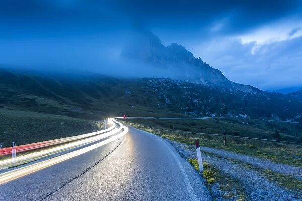 Traffic trail lights on Sella Pass, Province of Bolzano, South Tyrol, Italian Dolomites