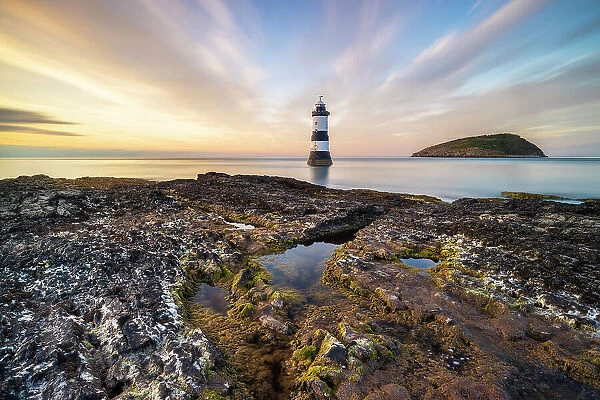 Trwyn Du Lighthouse at sunset in summer, Beaumaris, Wales, Great Britain, United Kingdom, Europe
