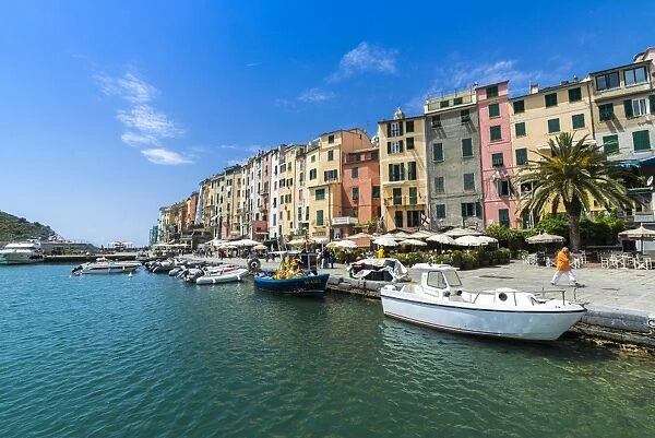 The turquoise sea frames the typical colored houses of Portovenere, UNESCO World Heritage Site