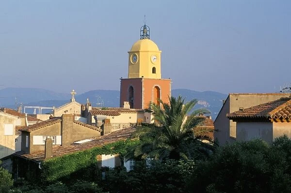 View to church across rooftops in early morning, St. Tropez, Var, Cote d Azur