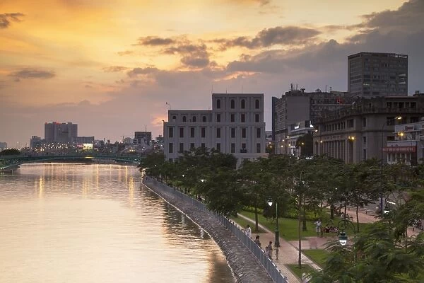 View of park and Ben Ngde River at sunset, Ho Chi Minh City, Vietnam, Indochina, Southeast Asia