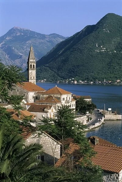 View over village with the church of St. Nikola belfry, Perast, The Boka Kotorska (Bay of Kotor), UNESCO World Heritage Site, Montenegro, Europe