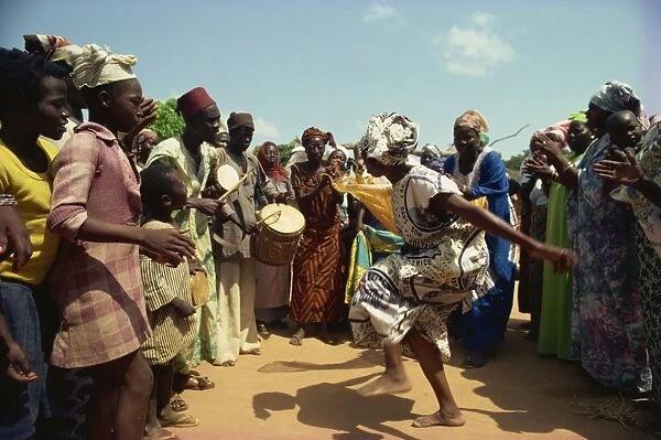 Woman dancing in fertility dance in Lobi Village, Burkina Faso, West Africa, Africa