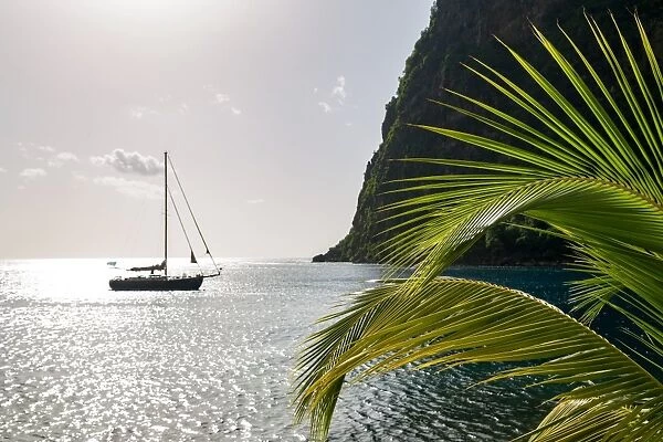 Yacht moored close to the base of Petit Piton, UNESCO World Heritage Site, near Sugar