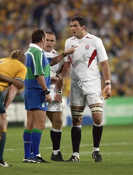 England captain Martin Johnson and referee Andre Watson exchange words during the 2003 World Cup Final