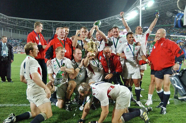 The England team celebrate after winning the World Cup in 2003