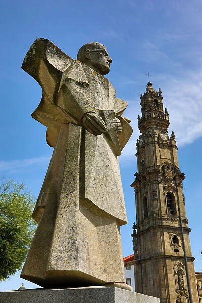 Statue of Antonio Ferreira Gomes and the Clerigos Tower in Porto, Portugal