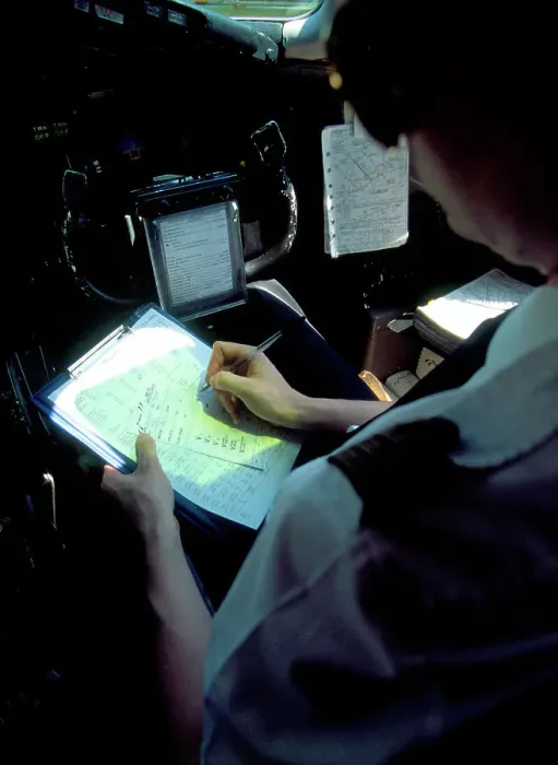 Framed Print : Print of MD83 Air Liberte pilot at work