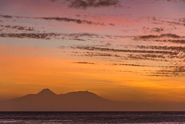 africa, Cape Verde, Santiago. sunset in Tarrafal with the volcano of Fogo in the far